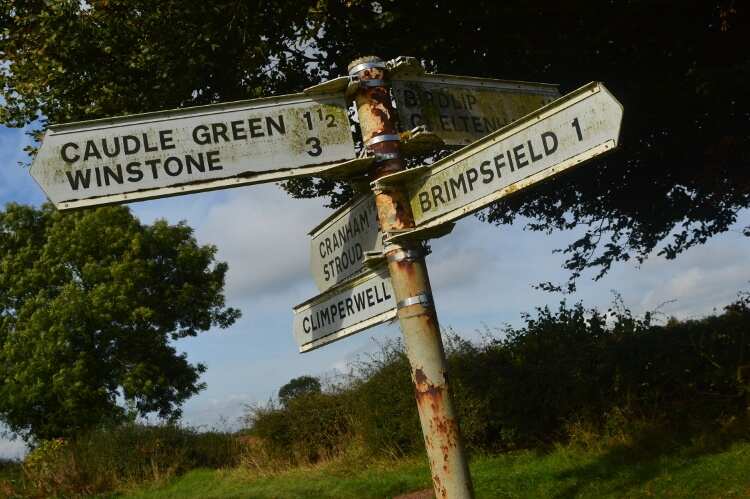 An old metal signpost in the Cotswolds.