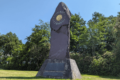 A large standing stone carved with Glyndwr's name.