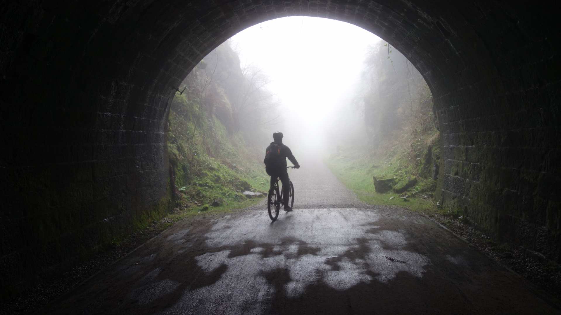 Cycling through Chee Tor Tunnel in the White Peak